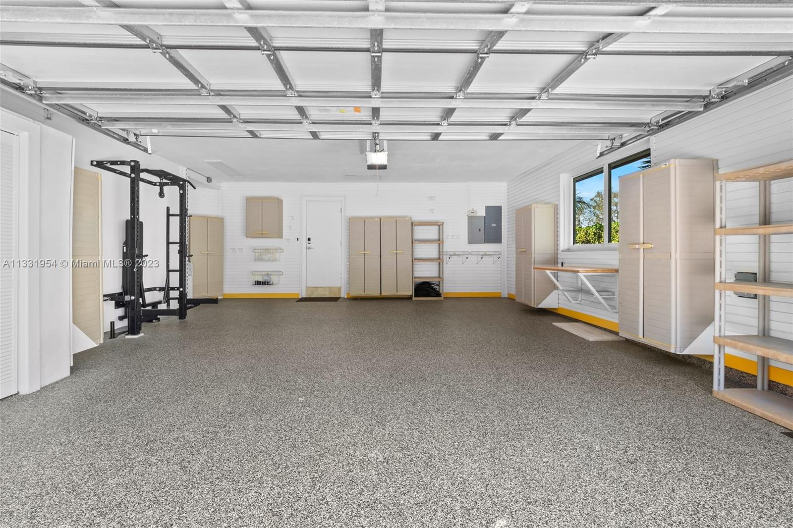 12050 Moss Ranch Road Pinecrest, FL 33156 - Photo 41 of 45 a view of a livingroom with staircase