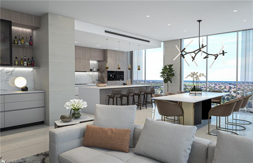 1925 Metropolitan Boulevard, Unit 901 Naples, FL 34104 - Photo 7 of 15 a living room with furniture a dining table and chairs