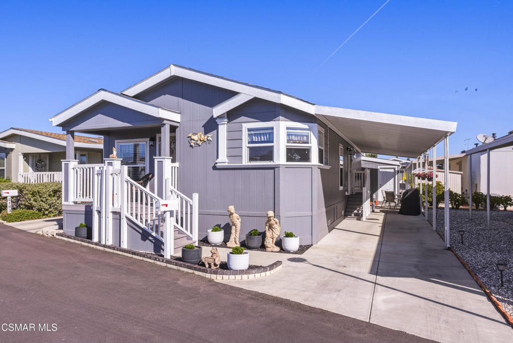 2167 Cardinal Avenue Oxnard, CA 93033 - Photo 1 of 36 a front view of a house with a porch