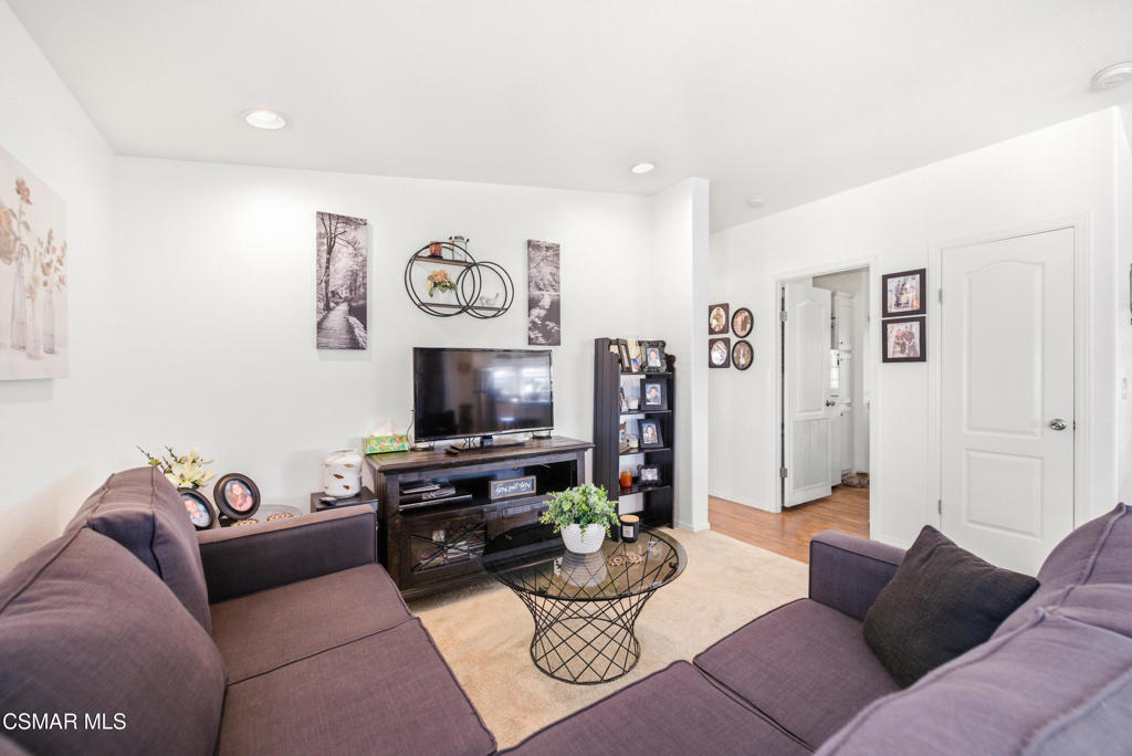 2167 Cardinal Avenue Oxnard, CA 93033 - Photo 12 of 36 a living room with furniture and a flat screen tv