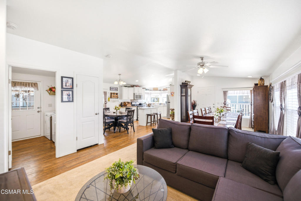 2167 Cardinal Avenue Oxnard, CA 93033 - Photo 13 of 36 a living room with furniture and a wooden floor