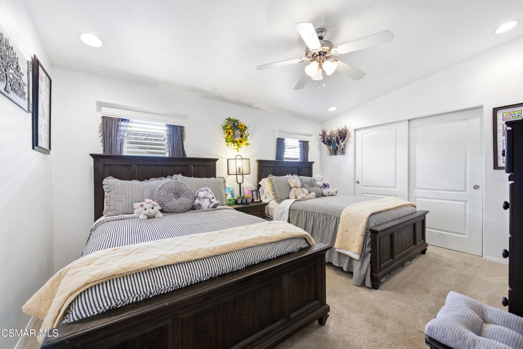 2167 Cardinal Avenue Oxnard, CA 93033 - Photo 22 of 36 a bedroom with bed and a ceiling fan