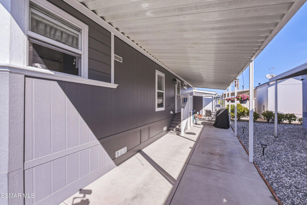 2167 Cardinal Avenue Oxnard, CA 93033 - Photo 30 of 36 a view of a porch with wooden floor