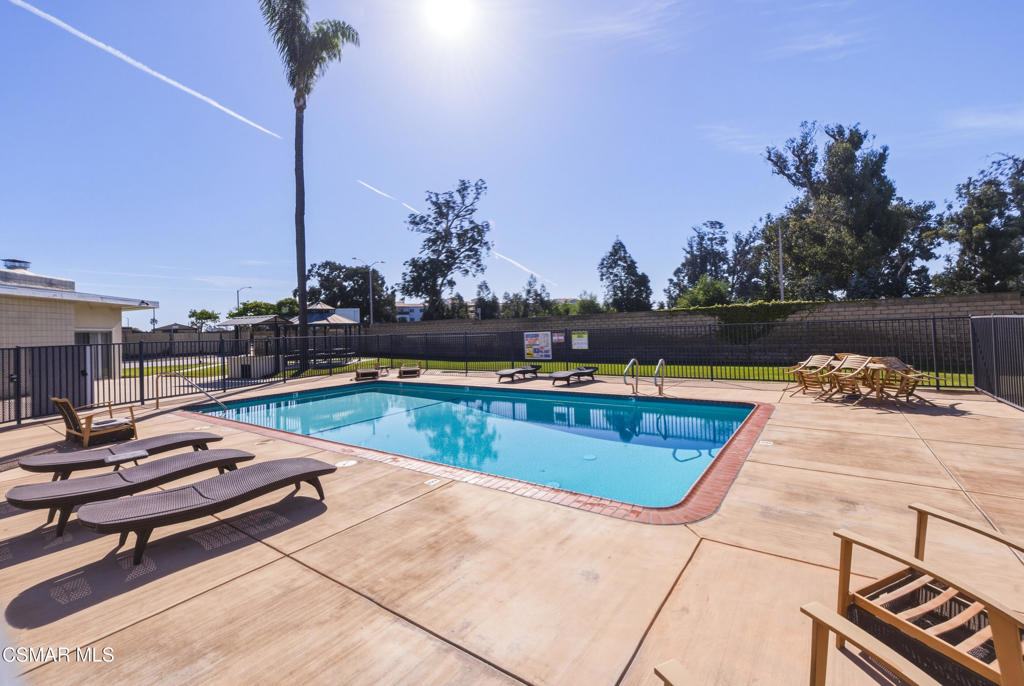 2167 Cardinal Avenue Oxnard, CA 93033 - Photo 33 of 36 a view of a swimming pool with lounge chairs