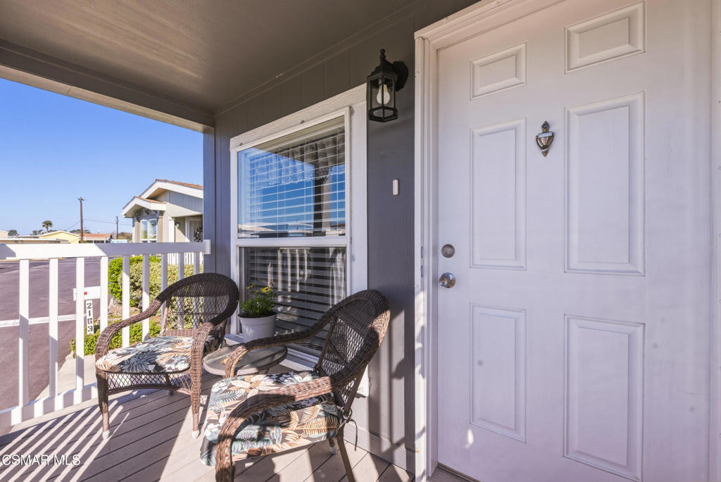 2167 Cardinal Avenue Oxnard, CA 93033 - Photo 5 of 36 a front view of a house with outdoor seating