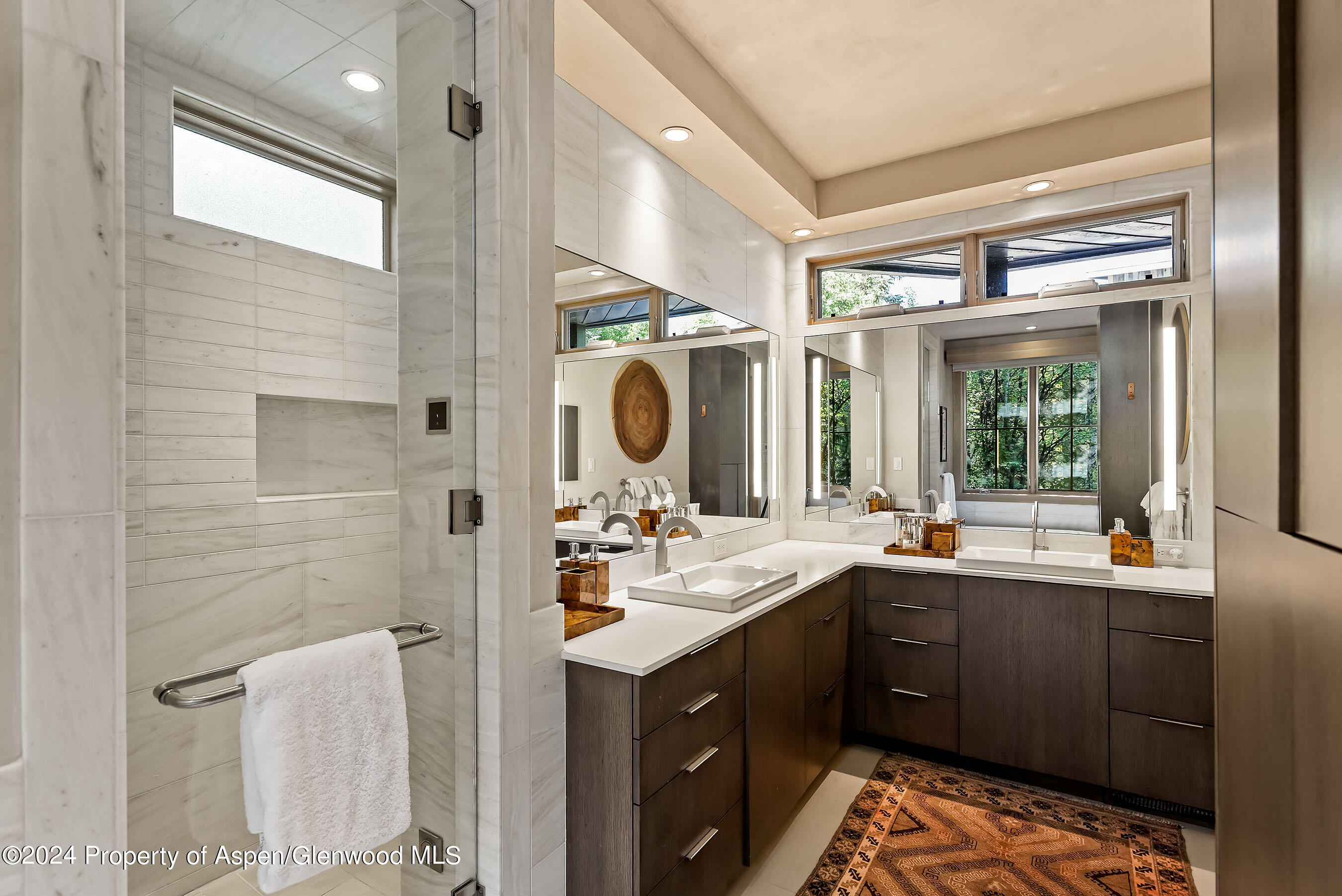1190 Riverside Drive Aspen, CO 81611 - Photo 16 of 31 a bathroom with a sink mirror and double