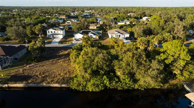 an aerial view of residential house with parking space