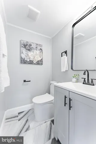 a bed room with a bed and a window