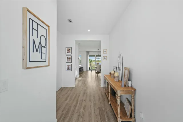 a view of a living room and dining room