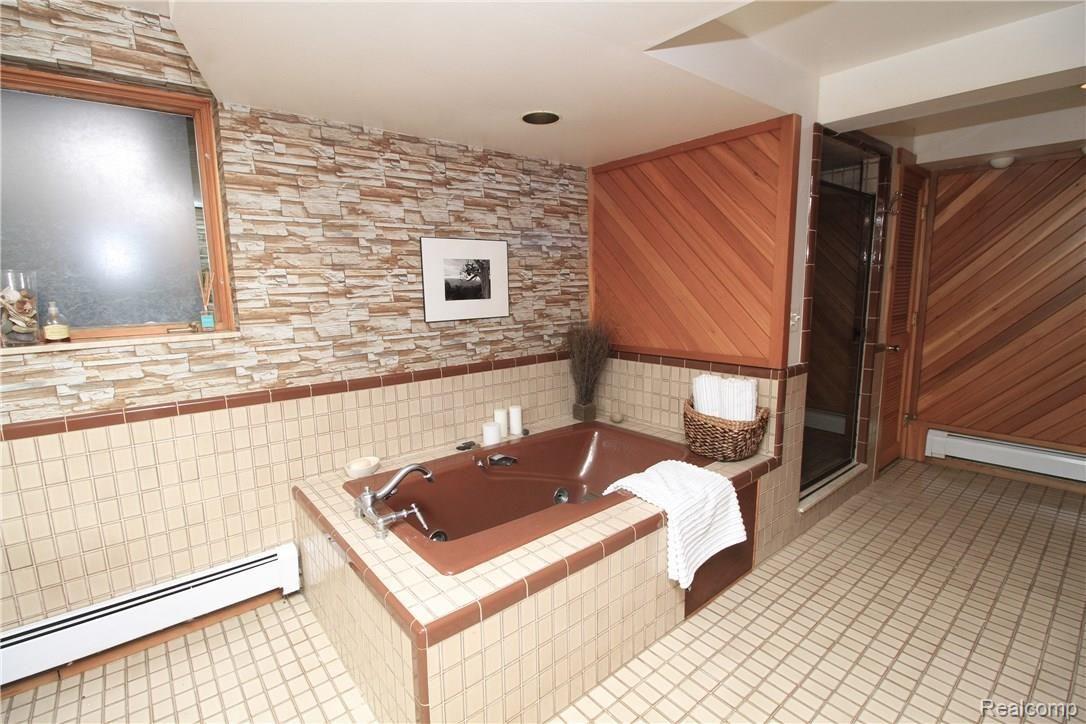 8374 Deerwood Road Clarkston, MI 48348 - Photo 34 of 38 Mid Modern Bath and Spa with Sauna