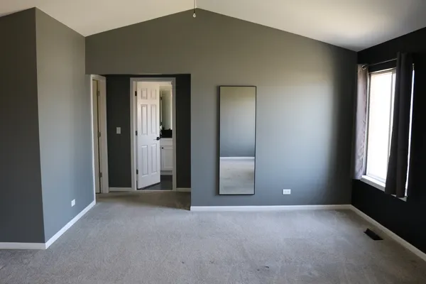 a view of a room with a window