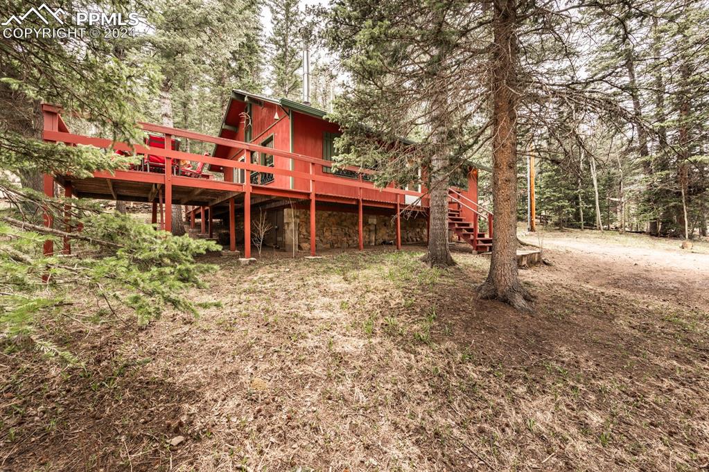 441 Westcliffe Drive Rye, CO 81069 - Photo 2 of 29 a view of a house with a yard and sitting area