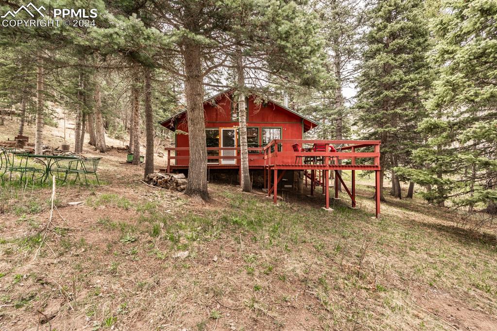 441 Westcliffe Drive Rye, CO 81069 - Photo 26 of 29 a view of a house with a yard porch and sitting area