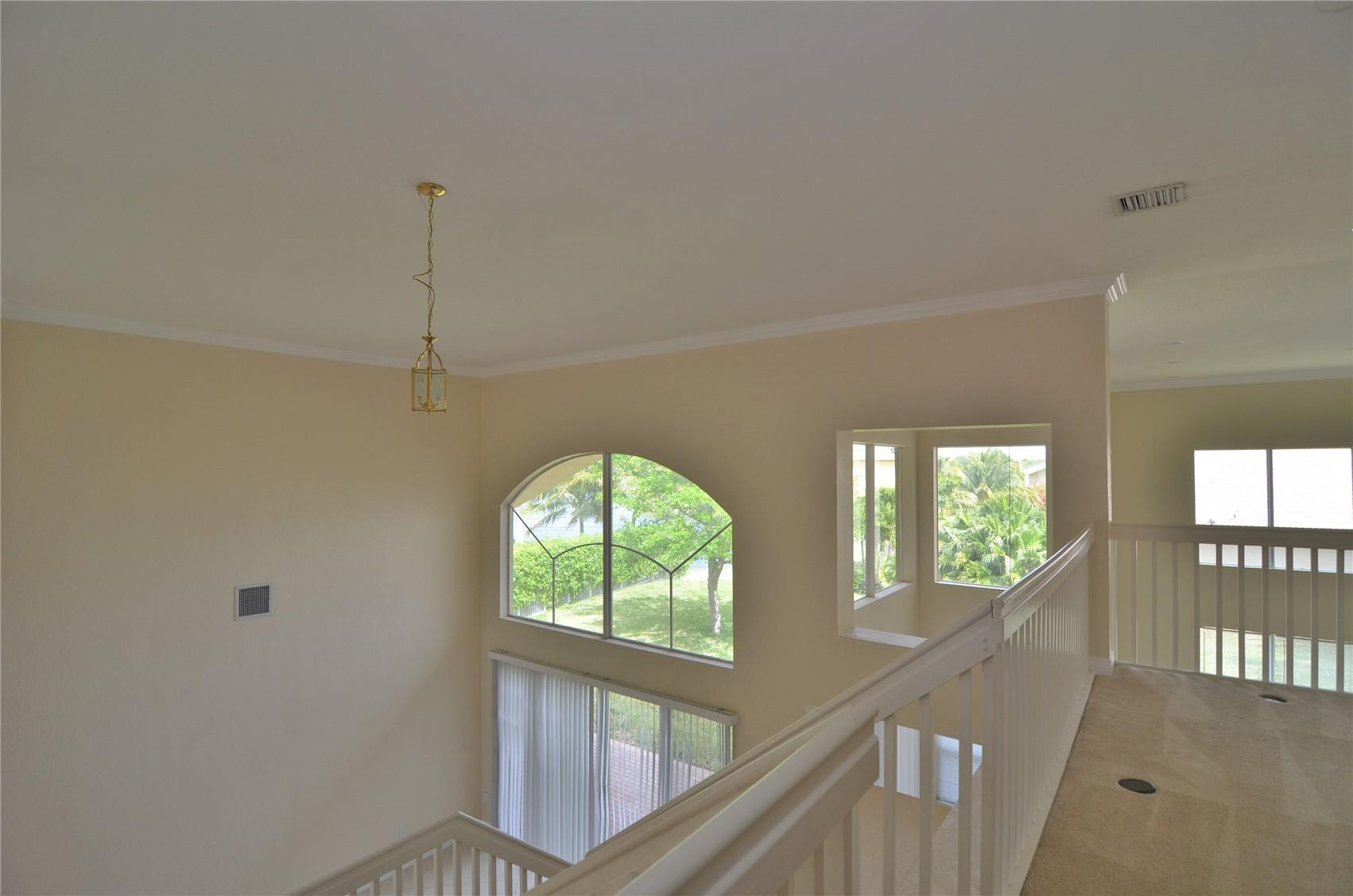 5455 Southwest 191st Terrace Miramar, FL 33029 - Photo 12 of 20 a view of an entryway with wooden floor