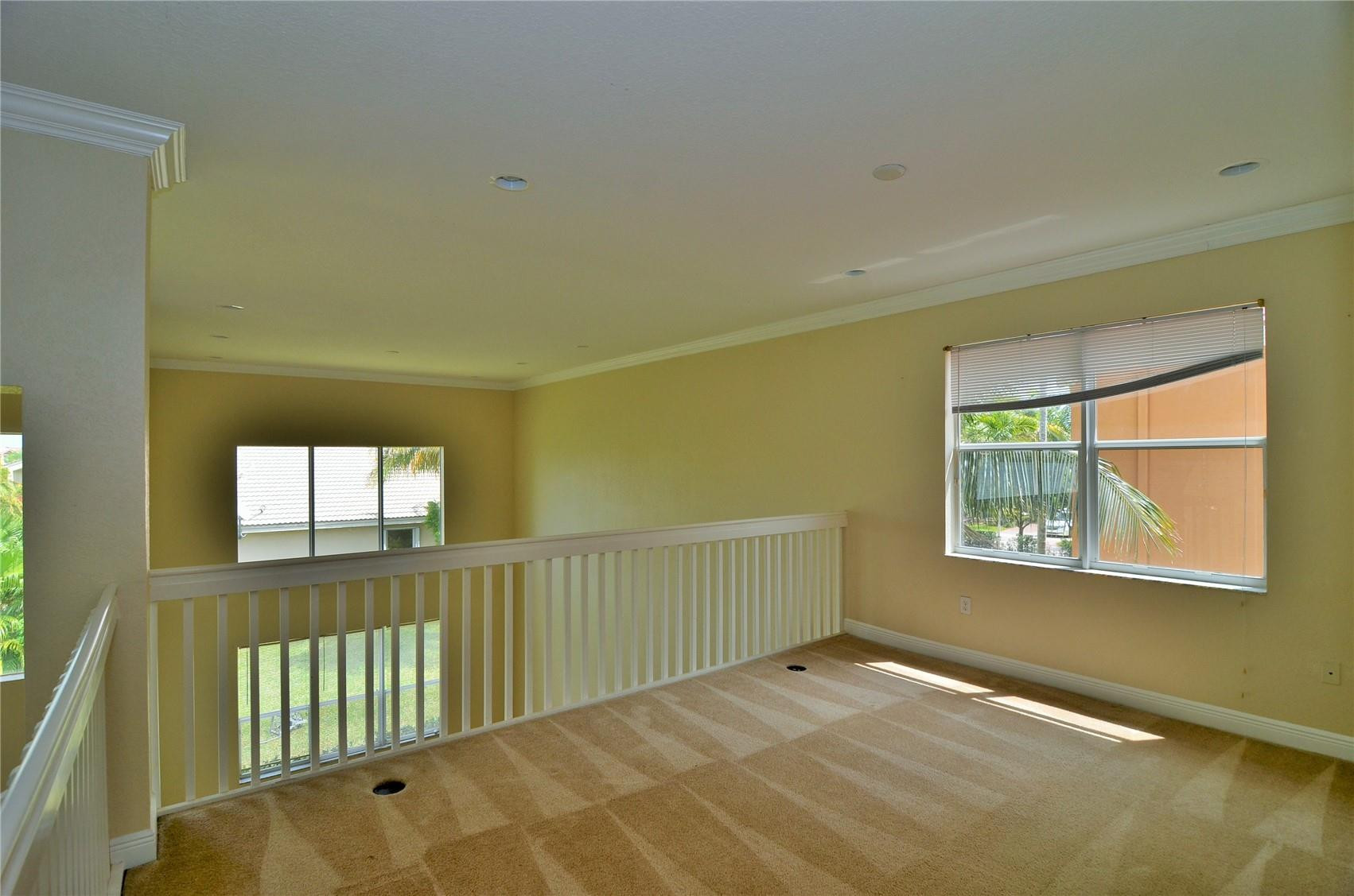 5455 Southwest 191st Terrace Miramar, FL 33029 - Photo 13 of 20 a view of an empty room with a window