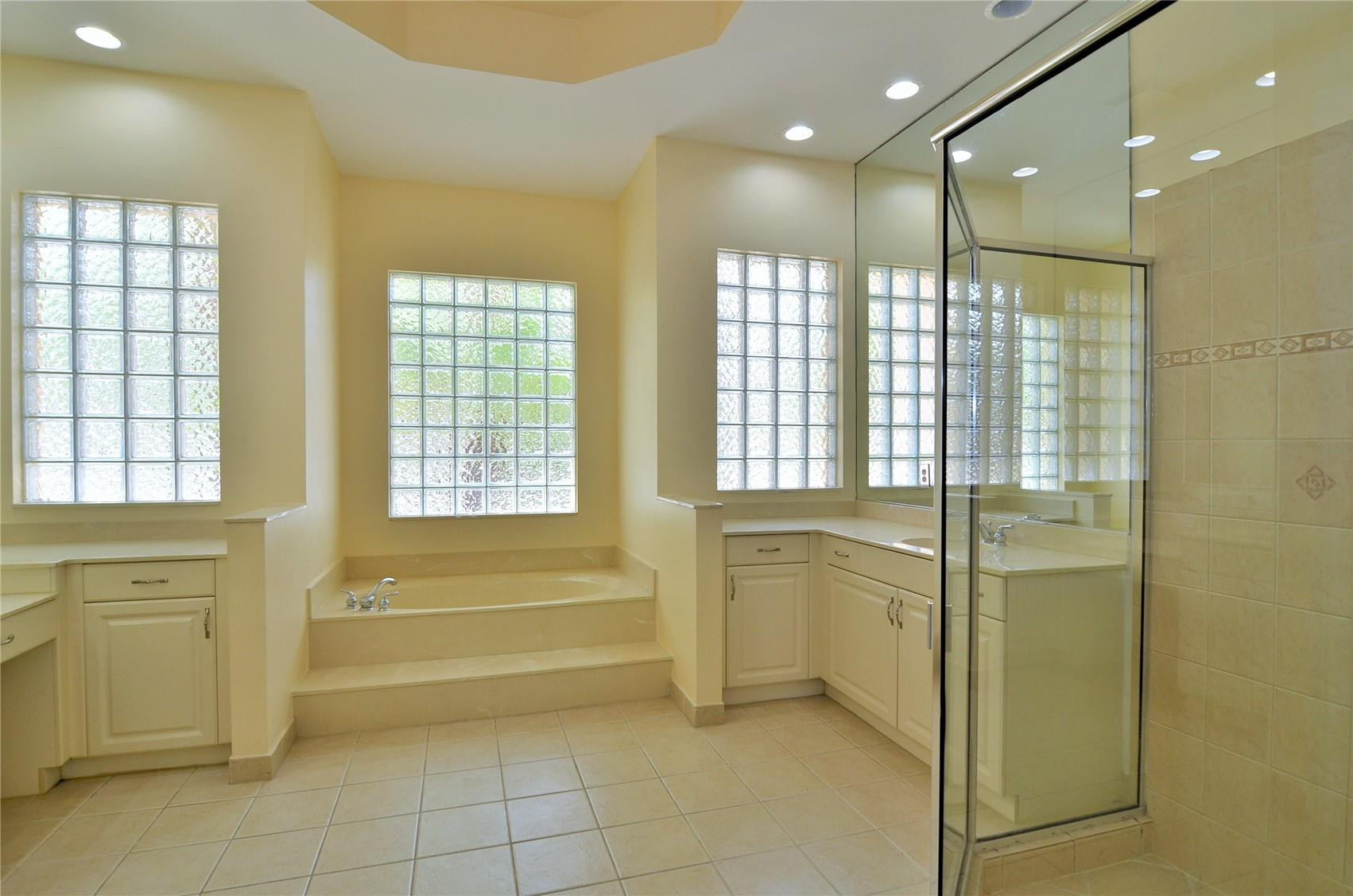 5455 Southwest 191st Terrace Miramar, FL 33029 - Photo 5 of 20 a bathroom with a bathtub and a shower