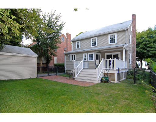 126 Bonad Road Brookline, MA 02467 - Photo 2 of 9 a view of a house with a yard porch and sitting area
