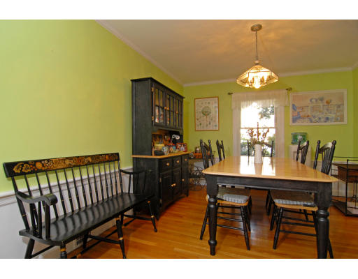 126 Bonad Road Brookline, MA 02467 - Photo 5 of 9 a dining room with furniture and chandelier