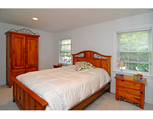 126 Bonad Road Brookline, MA 02467 - Photo 6 of 9 a bedroom with a bed and a window