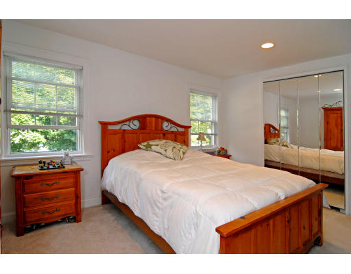 126 Bonad Road Brookline, MA 02467 - Photo 7 of 9 a bedroom with a bed and a dresser