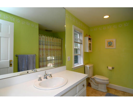 126 Bonad Road Brookline, MA 02467 - Photo 8 of 9 a bathroom with a sink and a mirror