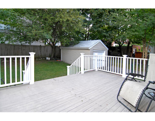 126 Bonad Road Brookline, MA 02467 - Photo 9 of 9 a view of a backyard with wooden fence