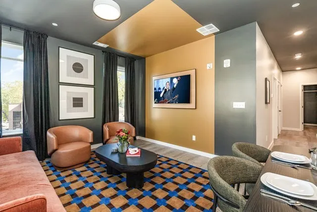 a bedroom with a bed and lamp