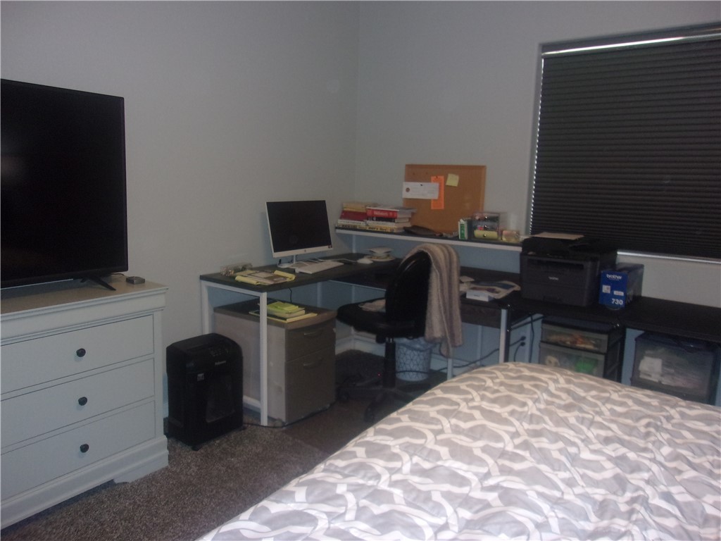 5414 Eagle View Road Kingman, AZ 86409 - Photo 13 of 39 Office space with dark carpet