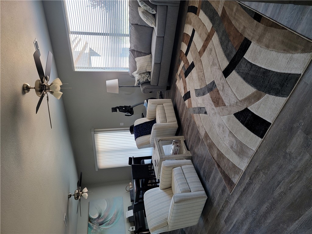 5414 Eagle View Road Kingman, AZ 86409 - Photo 36 of 39 Living room with ceiling fan, a textured ceiling, and wood finished floors