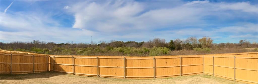 6408 Rienzi Drive Greenville, TX 75402 - Photo 20 of 20 a view of a balcony next to a yard