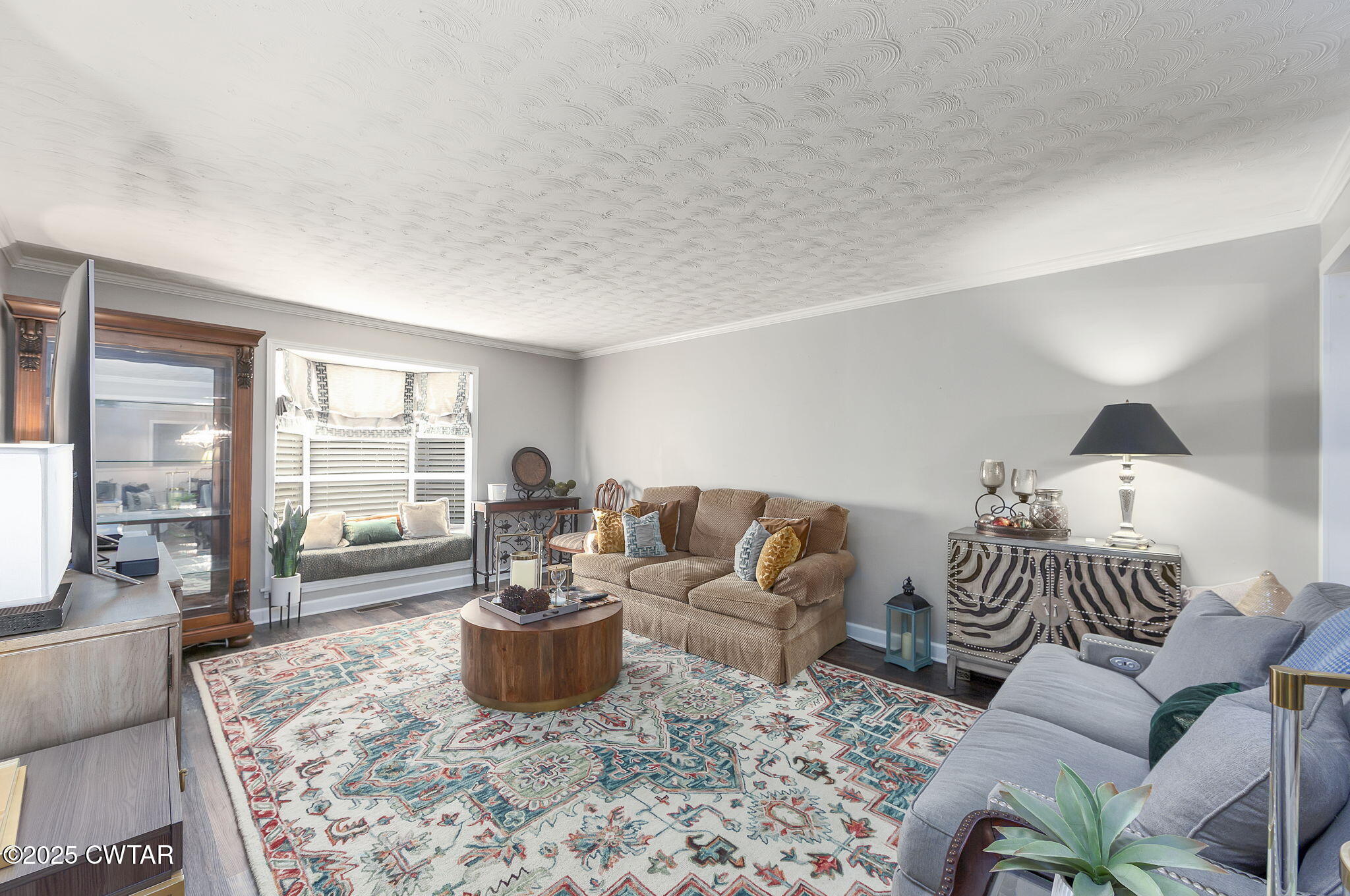 472 Old Denmark Road Jackson, TN 38301 - Photo 11 of 44 a living room with furniture and a wooden floor