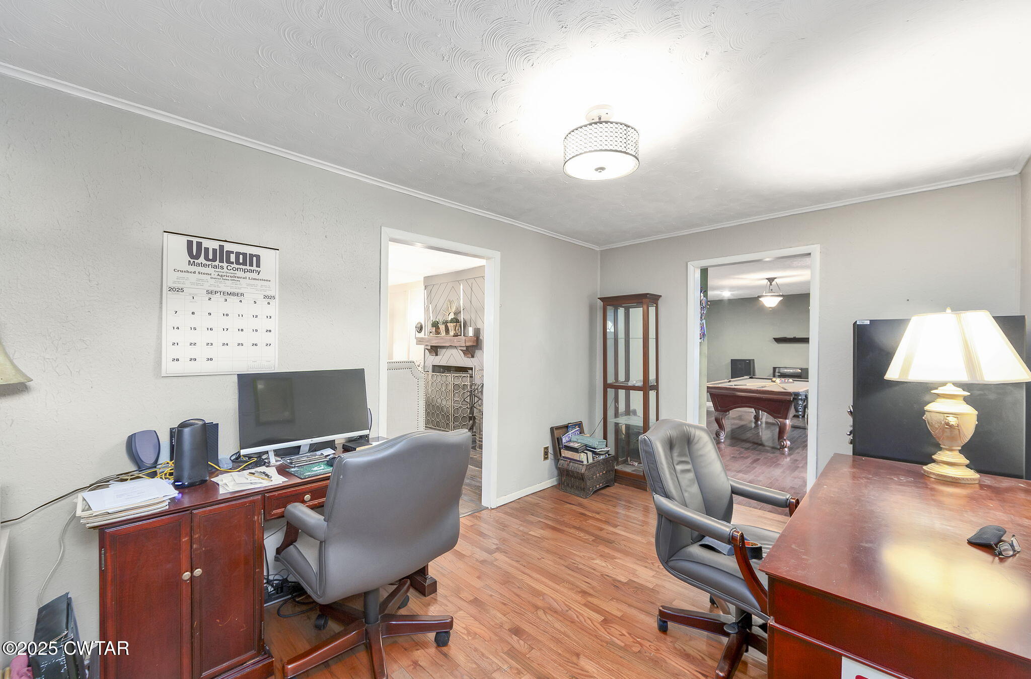 472 Old Denmark Road Jackson, TN 38301 - Photo 19 of 44 a view of a workspace with furniture and a window
