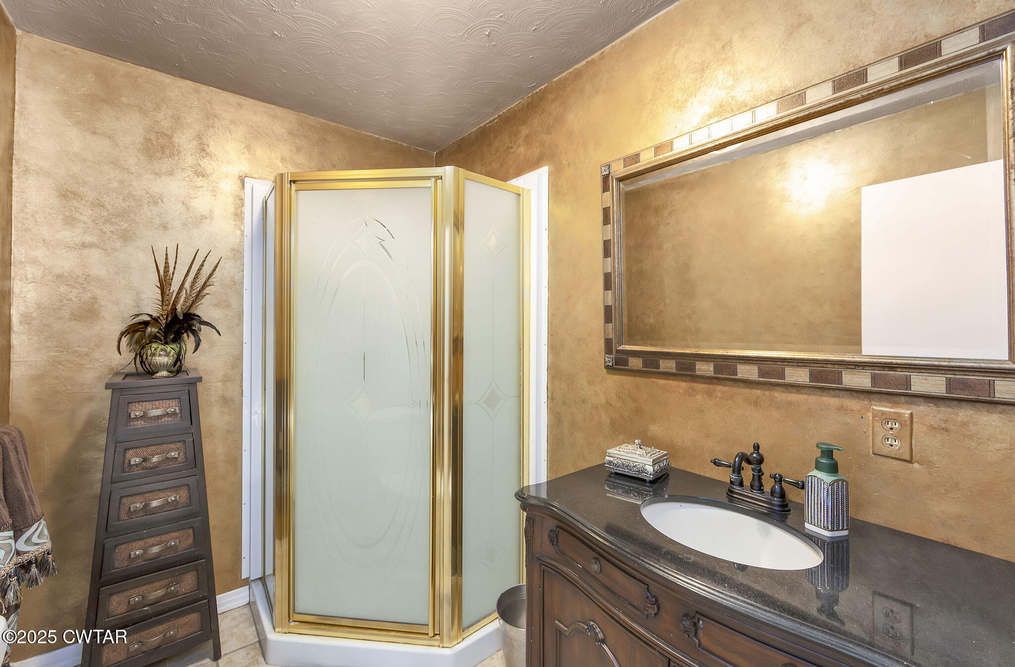 472 Old Denmark Road Jackson, TN 38301 - Photo 28 of 44 a bathroom with a granite countertop sink a mirror and shower