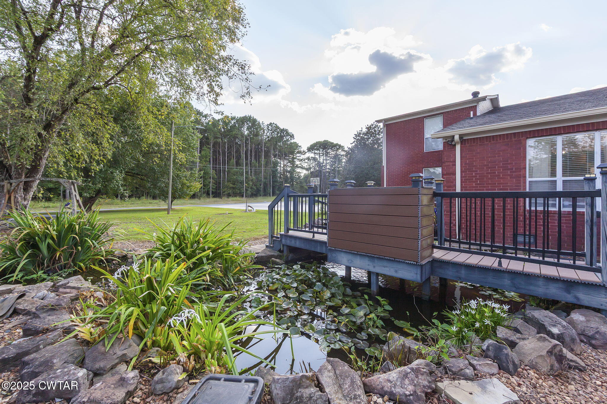 472 Old Denmark Road Jackson, TN 38301 - Photo 39 of 44 a view of a backyard with sitting area