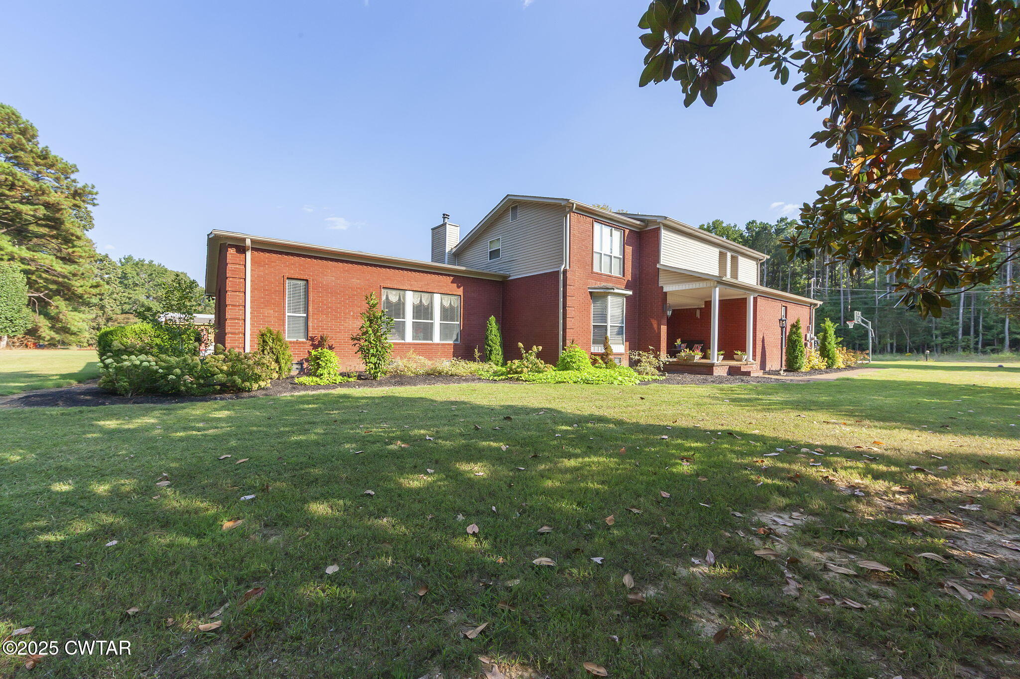472 Old Denmark Road Jackson, TN 38301 - Photo 4 of 44 a front view of house with yard and green space