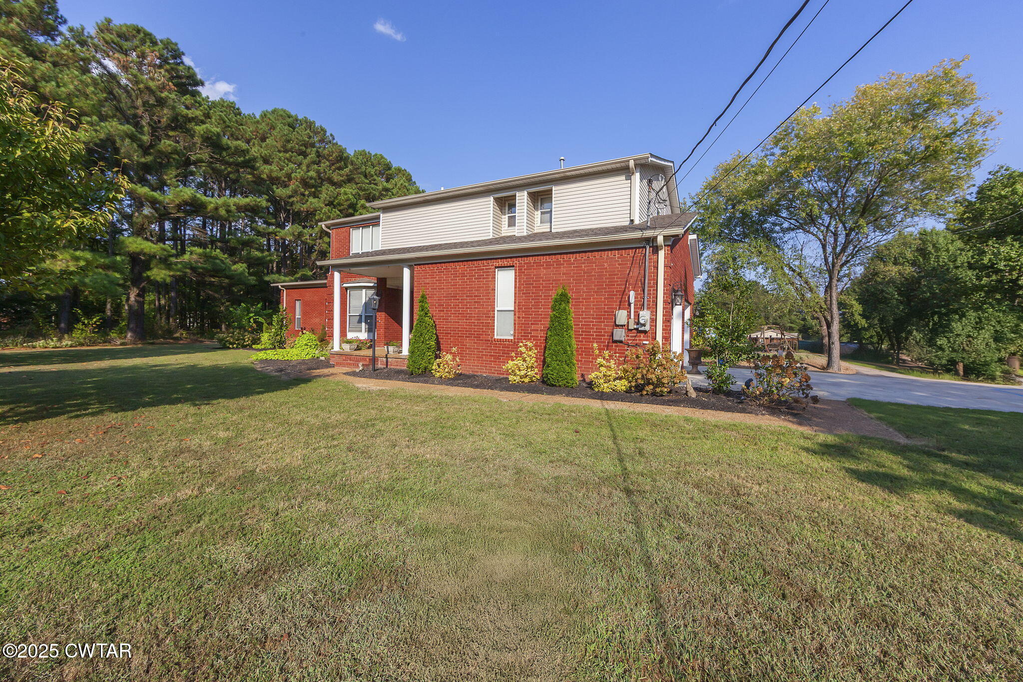 472 Old Denmark Road Jackson, TN 38301 - Photo 6 of 44 a front view of house with yard and green space