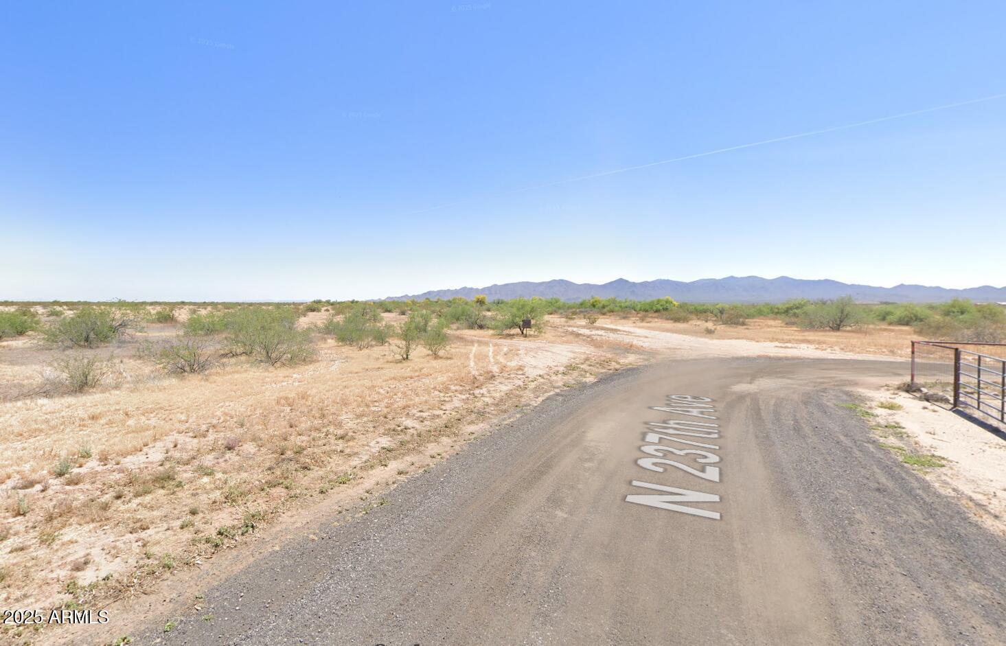 237-x-2 West Jomax Road, Unit 2 Wittmann, AZ 85361 - Photo 11 of 17 N 237th Dr towards the lots