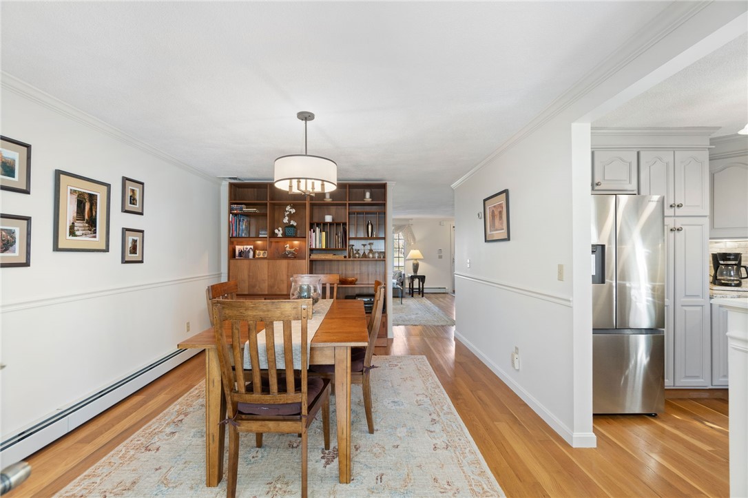 5 Eagle Run, Unit C Warwick, RI 02818 - Photo 11 of 32 Seamless flow from the kitchen to the dining room
