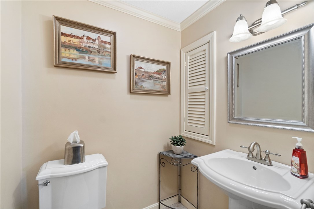 5 Eagle Run, Unit C Warwick, RI 02818 - Photo 13 of 32 First floor half bath with built in storage cabinet