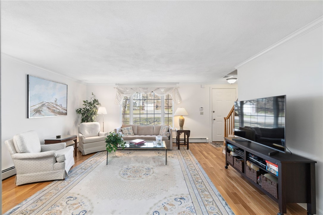 5 Eagle Run, Unit C Warwick, RI 02818 - Photo 8 of 32 The spacious living room is perfect for entertaining