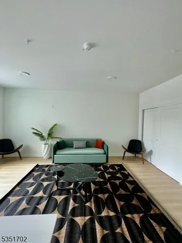 a bedroom with a bed and a walk in closet