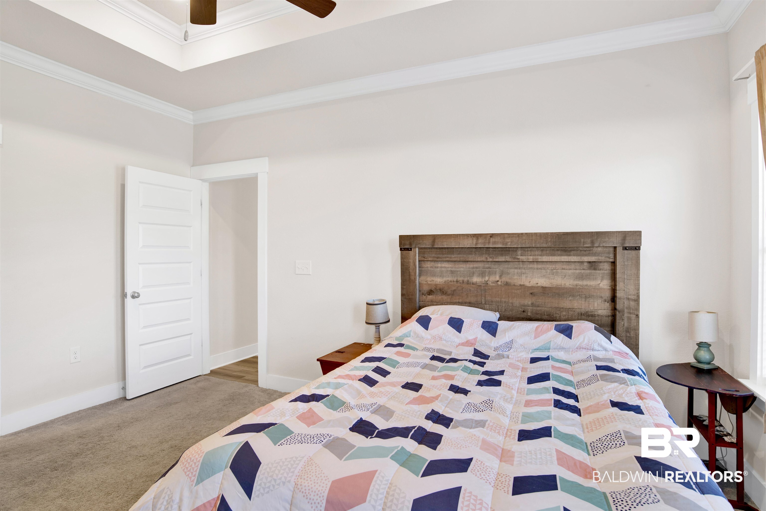 1174 Pheasant Circle Foley, AL 36535 - Photo 20 of 29 Bedroom with crown molding, carpet, and ceiling fan