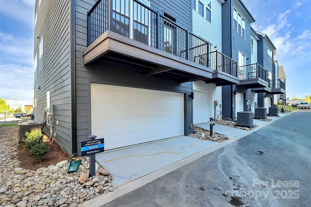 a view of a building with sitting area