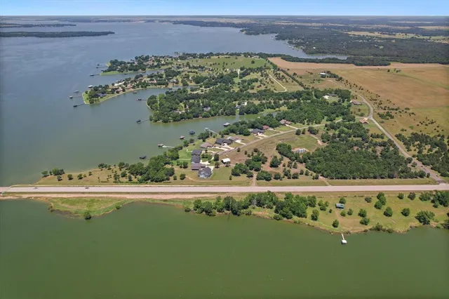 a view of a lake with houses with outdoor space