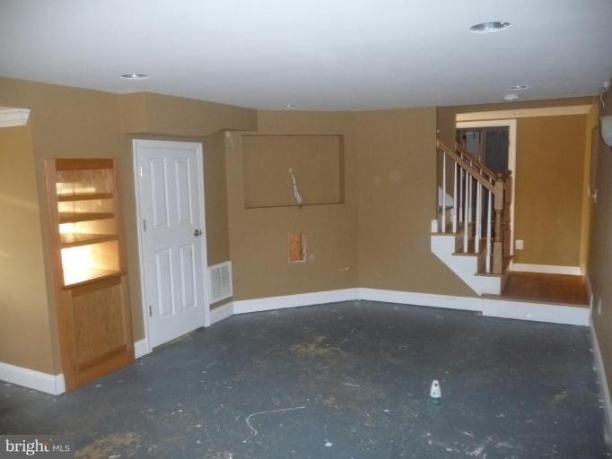 5193 Old Solomons Island Road Lothian, MD 20711 - Photo 2 of 22 Custom Partially Finished Basement