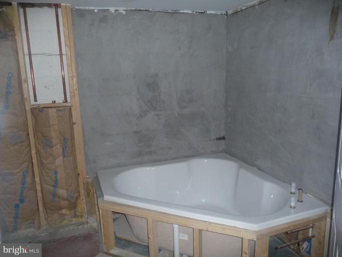 5193 Old Solomons Island Road Lothian, MD 20711 - Photo 14 of 22 Unfinished Basement Bathroom
