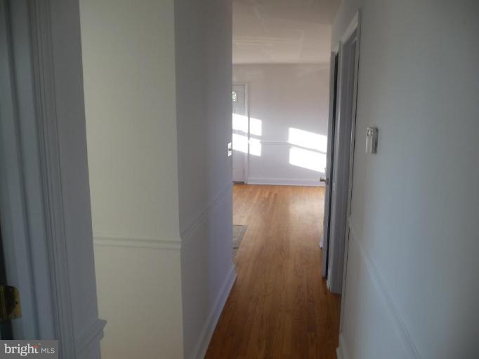 5193 Old Solomons Island Road Lothian, MD 20711 - Photo 7 of 22 Upstairs Hallway