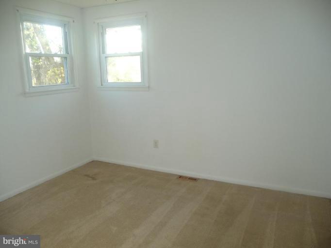 5193 Old Solomons Island Road Lothian, MD 20711 - Photo 8 of 22 1 of the 3 bedrooms upstairs