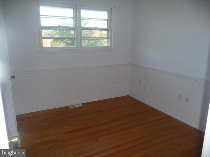 5193 Old Solomons Island Road Lothian, MD 20711 - Photo 9 of 22 1 of the 3 bedrooms upstairs