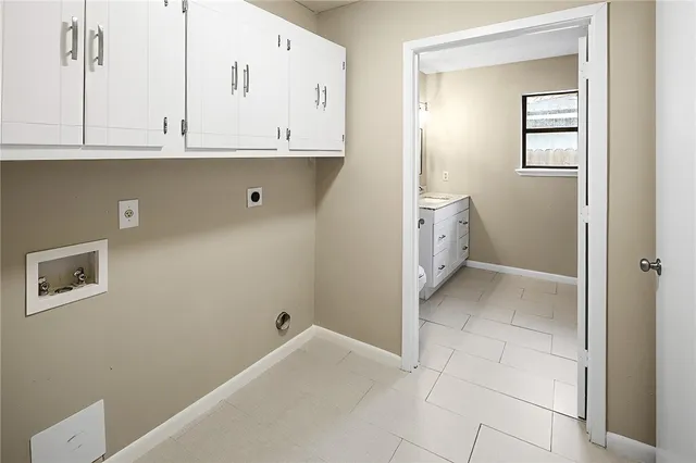 a view of cabinets and window